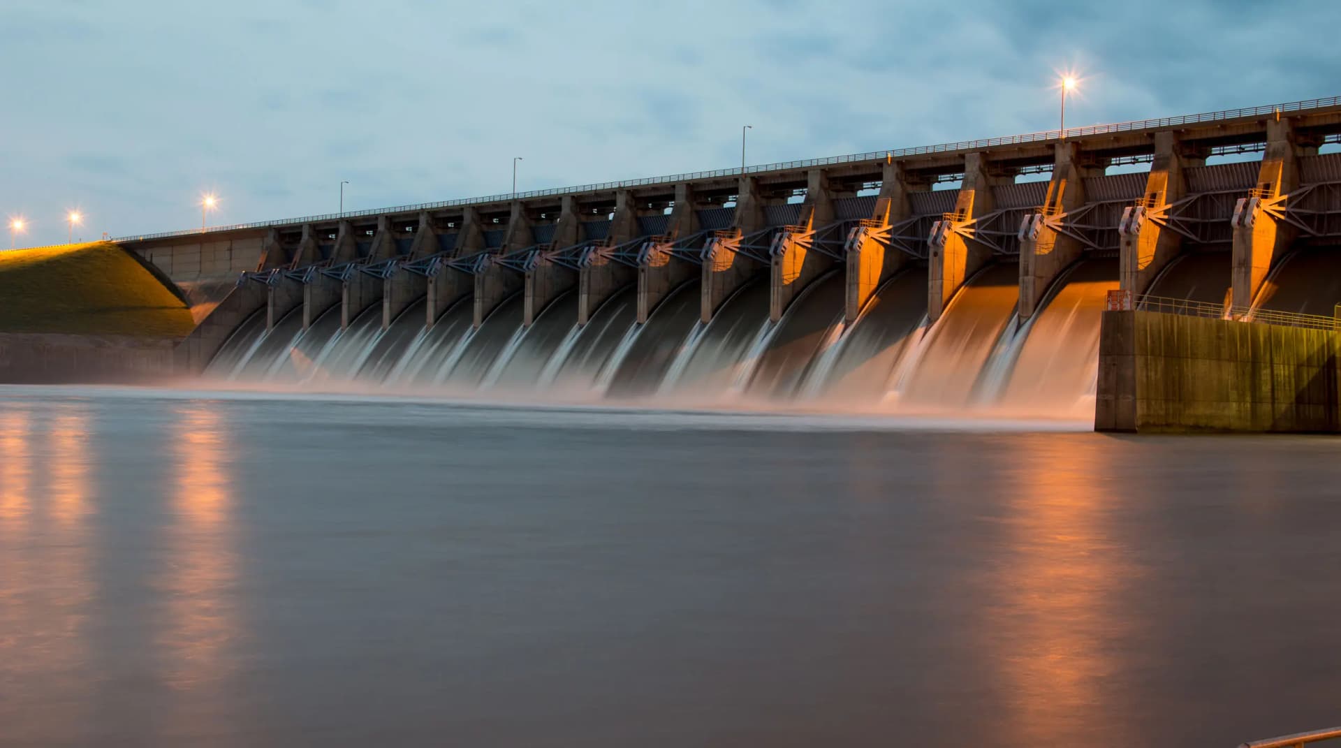 Efficient management of water infrastructure Dam spillways releasing water for flood control and stormwater management
